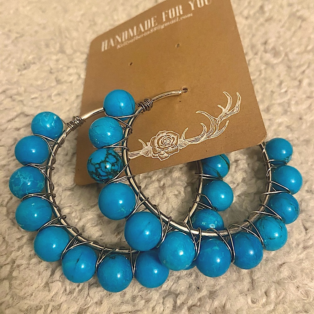 Sleeping beauty sterling silver , non allergenic hoops.  Hand crafted!